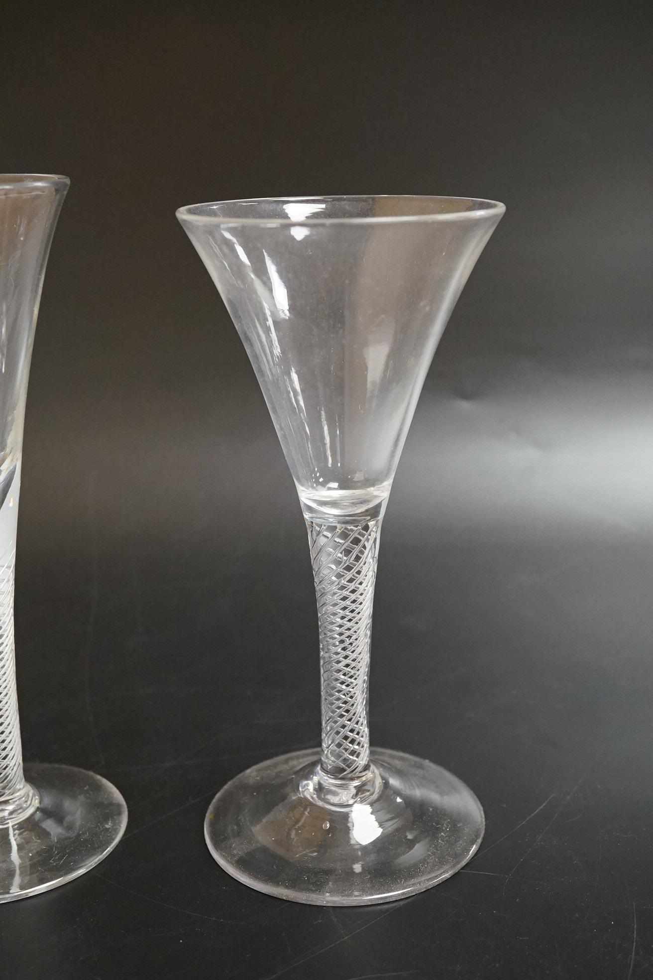 Two air twist stem funnel bowl wine glasses, c.1745, tallest 18.5cm high